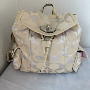 Coach Beige Logo Backpack Turn Lock Drawstring Silver Hardware Pink Lining Charm